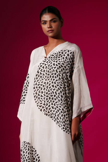 Stoique White Cotton, Lycra Beads Open Neck Asymmetric Abstract Print Midi Dress Online at Aza Fashions Stoique_White Cotton, Lycra Beads Open Neck Asymmetric Abstract Print Midi Dress _Online_at_Aza_Fashions