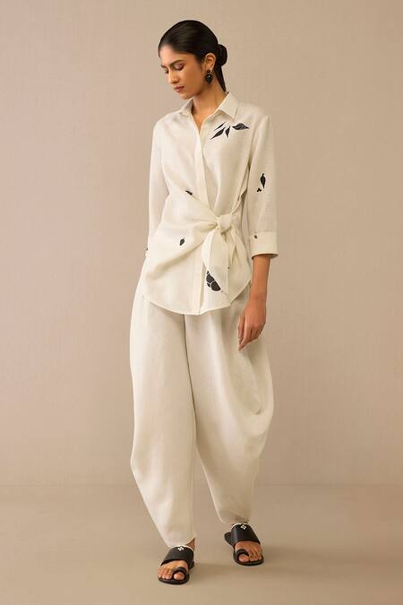 Ampm Ivory Linen Embroidery Collared Flower Pattern Side Tie Shirt And Dhoti Pant at Aza Fashions Ampm_Ivory Linen Embroidery Collared Flower Pattern Side Tie Shirt And Dhoti Pant _at_Aza_Fashions