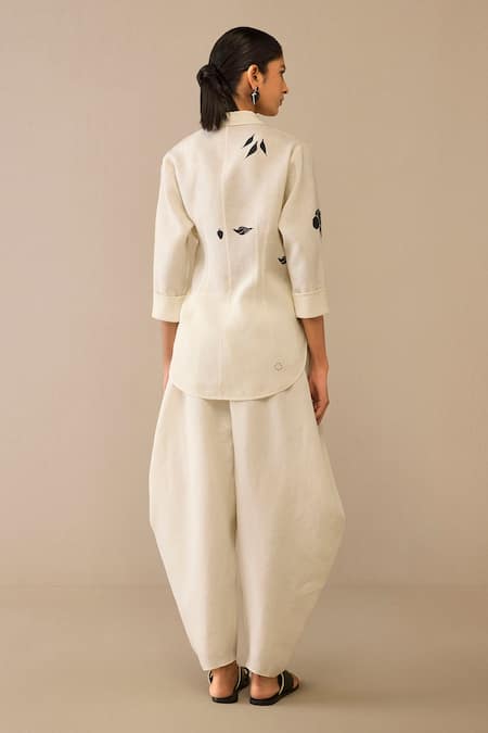 Shop Ampm Ivory Linen Embroidery Collared Flower Pattern Side Tie Shirt And Dhoti Pant at Aza Fashions Shop_Ampm_Ivory Linen Embroidery Collared Flower Pattern Side Tie Shirt And Dhoti Pant _at_Aza_Fashions