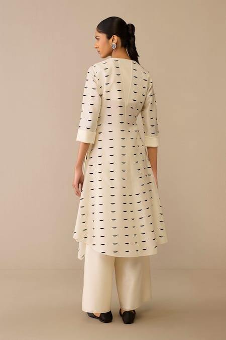 Shop Ampm Ivory Chanderi Brooches, Zari Shawl Neck Asymmetric Tunic And Palazzo Set at Aza Fashions Shop_Ampm_Ivory Chanderi Brooches, Zari Shawl Neck Asymmetric Tunic And Palazzo Set _at_Aza_Fashions