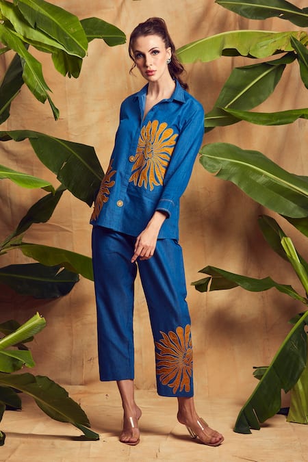 Shop Shagun Nagi The Label Blue Denim, Cotton Embroidery, Applique Collared Flower Cording Shirt And Pant Set at Aza Fashions Shop_Shagun Nagi The Label_Blue Denim, Cotton Embroidery, Applique Collared Flower Cording Shirt And Pant Set _at_Aza_Fashions
