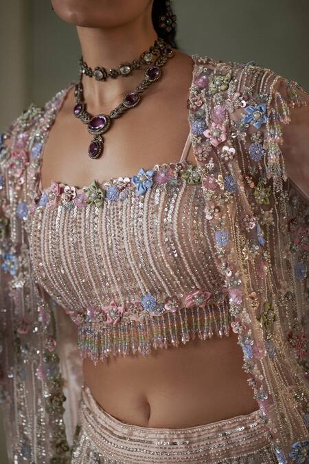 Nitika Gujral_Peach Net, Satin Pearls, Sequins, 3d Bloom Embellished Jacket And Lehenga Set _Online_at_Aza_Fashions