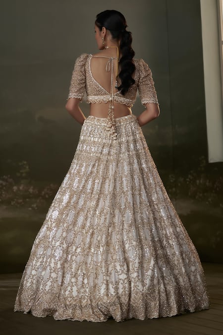 Shop Nitika Gujral Gold Satin, Net Pearls, Sequins, Crystals, Beads, Gulshan Bridal Lehenga Set at Aza Fashions Shop_Nitika Gujral_Gold Satin, Net Pearls, Sequins, Crystals, Beads, Gulshan Bridal Lehenga Set _at_Aza_Fashions