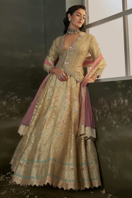 Nitika Gujral_Gold Net, Satin, Silk Mirrors, Embroidery V-neck Jacket Blouse And Lehenga _Online_at_Aza_Fashions
