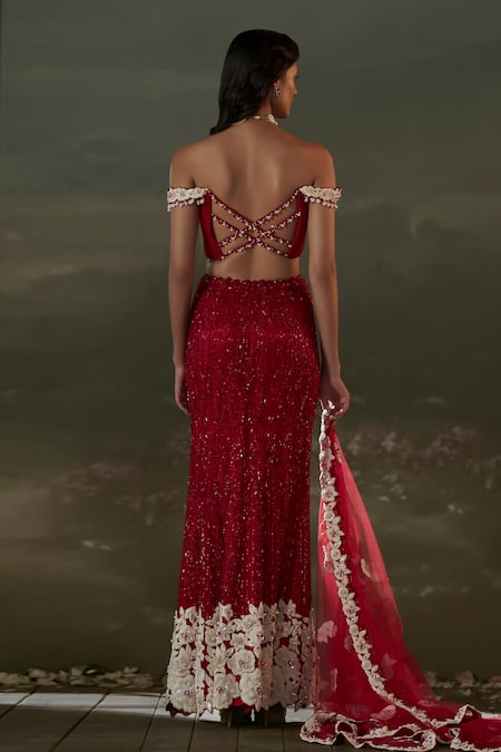 Shop Nitika Gujral Red Net, Satin, Chiffon Sequins, Cut Work, Pleated Off Crop Top And Skirt Set at Aza Fashions Shop_Nitika Gujral_Red Net, Satin, Chiffon Sequins, Cut Work, Pleated Off Crop Top And Skirt Set _at_Aza_Fashions