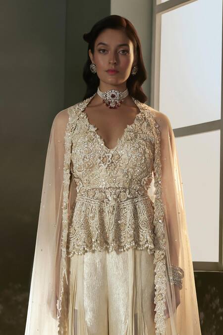 Nitika Gujral_Cream Georgette, Organza, Net Embroidery, Crystals, Peplum Top And Sharara Set _Online_at_Aza_Fashions