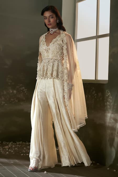 Shop_Nitika Gujral_Cream Georgette, Organza, Net Embroidery, Crystals, Peplum Top And Sharara Set _Online_at_Aza_Fashions