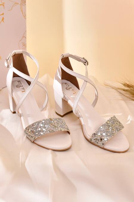 Shop LA Fiza White Mirrors, Sequins And Work Strappy Block Heels at Aza Fashions Shop_LA Fiza_White Mirrors, Sequins And Work Strappy Block Heels_at_Aza_Fashions