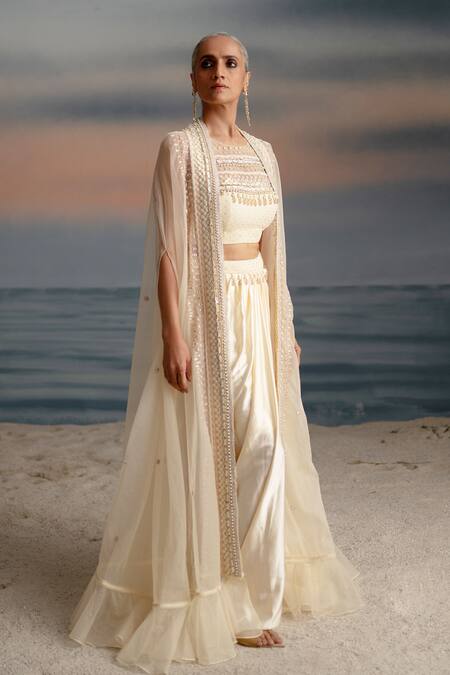 Shop Shashank Arya Ivory Organza, Satin, Lycra Pearls, Seashell Embellished Cape Dhoti Skirt Set Online at Aza Fashions Shop_Shashank Arya_Ivory Organza, Satin, Lycra Pearls, Seashell Embellished Cape Dhoti Skirt Set _Online_at_Aza_Fashions