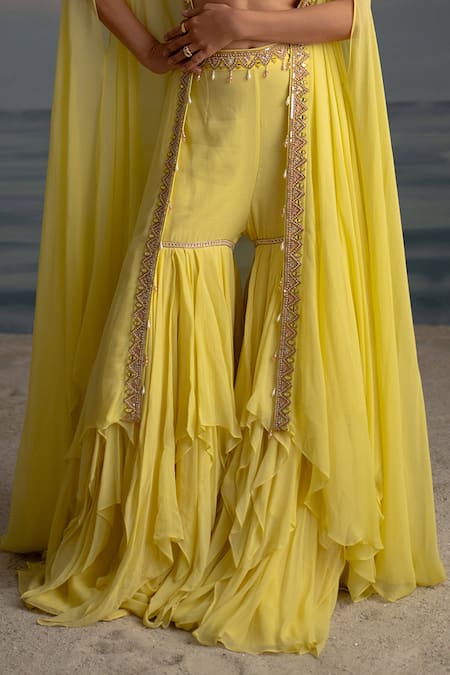 Buy Shashank Arya Yellow Georgette, Satin, Silk Pearls, Embroidered Cape Layered Sharara Set Online at Aza Fashions Buy_Shashank Arya_Yellow Georgette, Satin, Silk Pearls, Embroidered Cape Layered Sharara Set _Online_at_Aza_Fashions