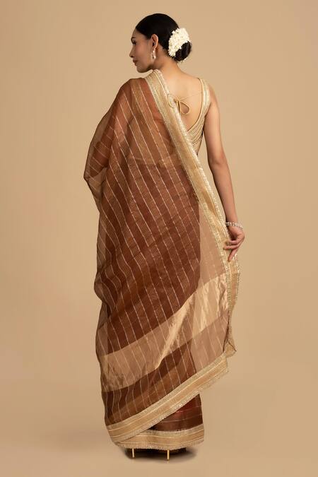 Shop Zal From Benaras Brown Silk, Tissue Zari, Sequins Hand Woven Stripe Saree With Embroidered Blouse at Aza Fashions Shop_Zal From Benaras_Brown Silk, Tissue Zari, Sequins Hand Woven Stripe Saree With Embroidered Blouse_at_Aza_Fashions
