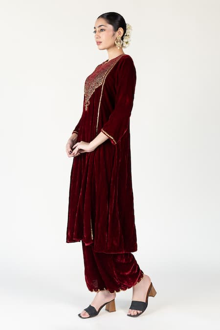 Nirjara Maroon Silk, Velvet Embroidery, Zari Round Neck Zardozi Kurta Set Online at Aza Fashions Nirjara_Maroon Silk, Velvet Embroidery, Zari Round Neck Zardozi Kurta Set _Online_at_Aza_Fashions