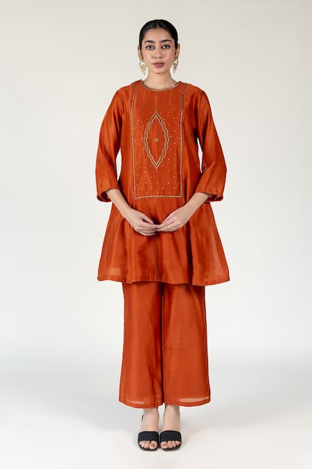 Nirjara Tikki Embroidered Orange Kurta Set 