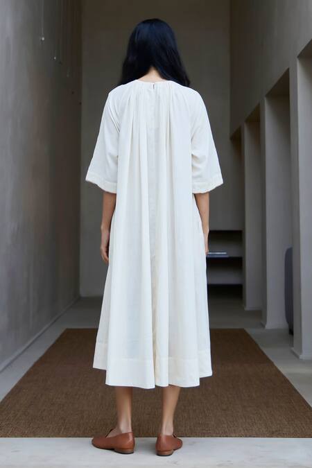 Shop The Summer House Off White Handloom Cotton Round Neck Handwoven Striped Midi Dress at Aza Fashions Shop_The Summer House_Off White Handloom Cotton Round Neck Handwoven Striped Midi Dress_at_Aza_Fashions