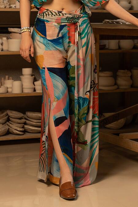 Zilaire Multi Color Crepe V-neck Tropical Print Wrap Crop Top And Palazzo Set Online at Aza Fashions Zilaire_Multi Color Crepe V-neck Tropical Print Wrap Crop Top And Palazzo Set _Online_at_Aza_Fashions