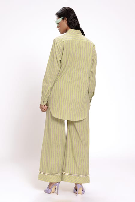 Shop Doh Tak Keh Green Cotton Woven Stripe Flared Trouser at Aza Fashions Shop_Doh Tak Keh_Green Cotton Woven Stripe Flared Trouser_at_Aza_Fashions
