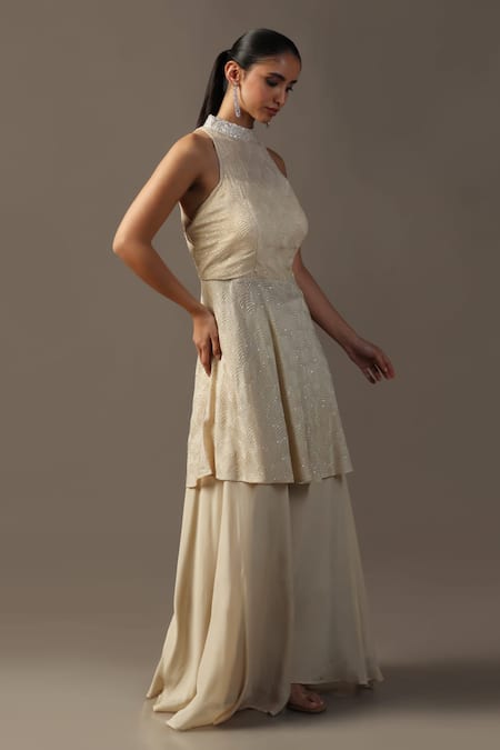 Two Sisters By Gyans Ivory Georgette Sequins, Embroidery Halter Neck Peplum Kurta Set Online at Aza Fashions Two Sisters By Gyans_Ivory Georgette Sequins, Embroidery Halter Neck Peplum Kurta Set _Online_at_Aza_Fashions