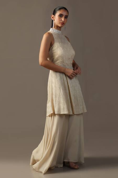 Buy Two Sisters By Gyans Ivory Georgette Sequins, Embroidery Halter Neck Peplum Kurta Set Online at Aza Fashions Buy_Two Sisters By Gyans_Ivory Georgette Sequins, Embroidery Halter Neck Peplum Kurta Set _Online_at_Aza_Fashions