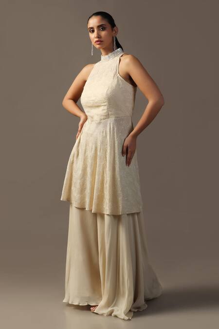 Shop Two Sisters By Gyans Ivory Georgette Sequins, Embroidery Halter Neck Peplum Kurta Set Online at Aza Fashions Shop_Two Sisters By Gyans_Ivory Georgette Sequins, Embroidery Halter Neck Peplum Kurta Set _Online_at_Aza_Fashions