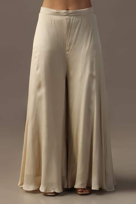 Two Sisters By Gyans Ivory Georgette Sequins, Embroidery Halter Neck Peplum Kurta Set at Aza Fashions Two Sisters By Gyans_Ivory Georgette Sequins, Embroidery Halter Neck Peplum Kurta Set _at_Aza_Fashions