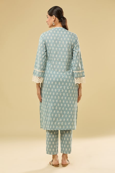 Shop Samyukta Singhania Blue Cotton Tassels V-neck Floral Printed Kurta Set With Pant at Aza Fashions Shop_Samyukta Singhania_Blue Cotton Tassels V-neck Floral Printed Kurta Set With Pant _at_Aza_Fashions