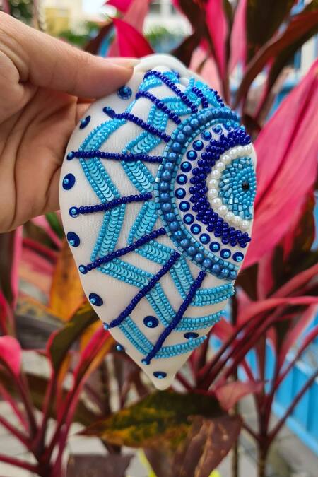 The House Of Aqua_White Sequins, Beads, Pearls Evil Eye Embroidered Headband _at_Aza_Fashions