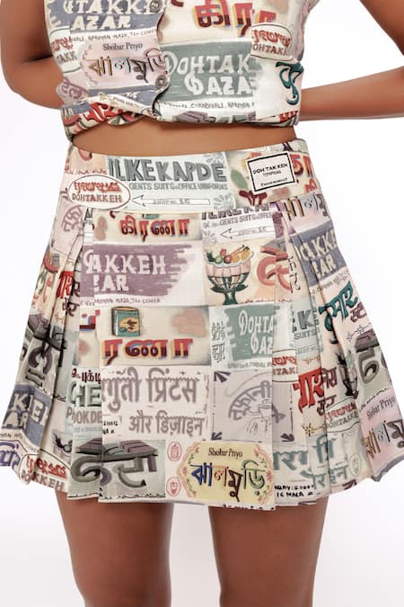 Shop_Doh Tak Keh_Ivory Rayon Hand-illustrated Pleated Short Skirt _Online_at_Aza_Fashions