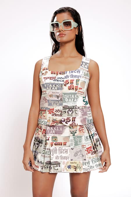 Doh Tak Keh_Ivory Rayon Round Neck Vigyaapan Illustrated Sleeveless Vest _Online_at_Aza_Fashions