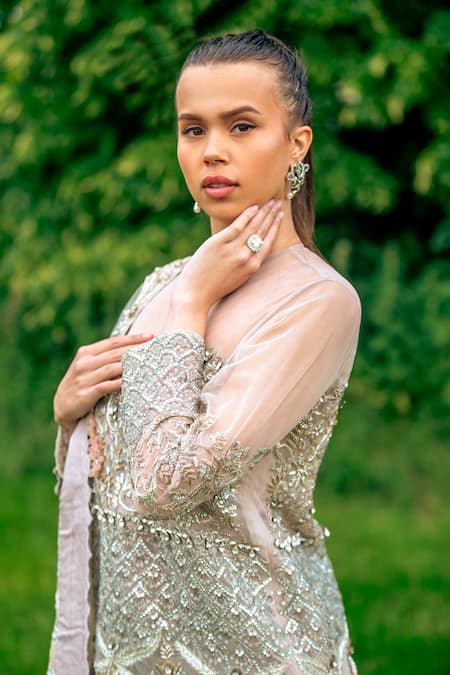 tara thakur Gold Net, Tissue Embroidery, Sequins, Zari Round Neck Zardozi Lehenga Set at Aza Fashions tara thakur_Gold Net, Tissue Embroidery, Sequins, Zari Round Neck Zardozi Lehenga Set _at_Aza_Fashions