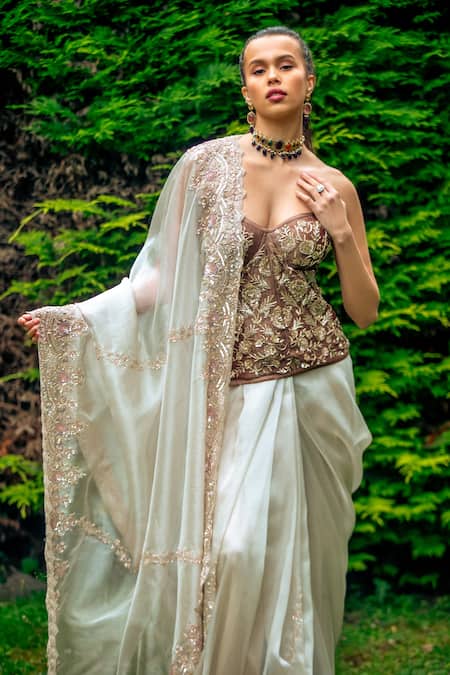tara thakur Cream Organza, Tissue Embroidery, Zari, Floral Corset Blouse And Draped Skirt Set Online at Aza Fashions tara thakur_Cream Organza, Tissue Embroidery, Zari, Floral Corset Blouse And Draped Skirt Set _Online_at_Aza_Fashions