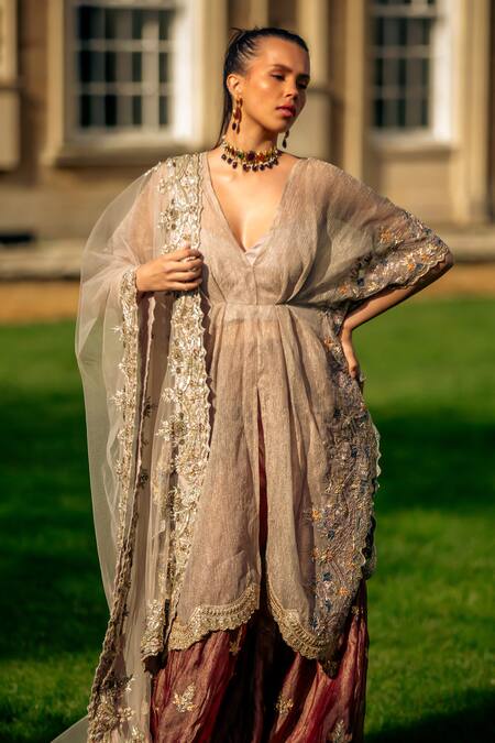 tara thakur_Ivory Net, Tissue Sequins, Zari, Embroidery Plunge Neck Kaftan Sharara Set _at_Aza_Fashions