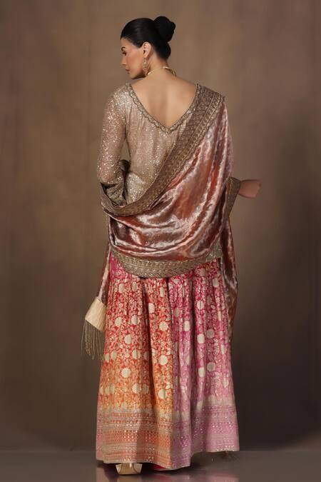 Shop tara thakur Gold Tissue, Brocade Sequins, Zari V-neck Embroidered Tunic Sharara Set at Aza Fashions Shop_tara thakur_Gold Tissue, Brocade Sequins, Zari V-neck Embroidered Tunic Sharara Set_at_Aza_Fashions