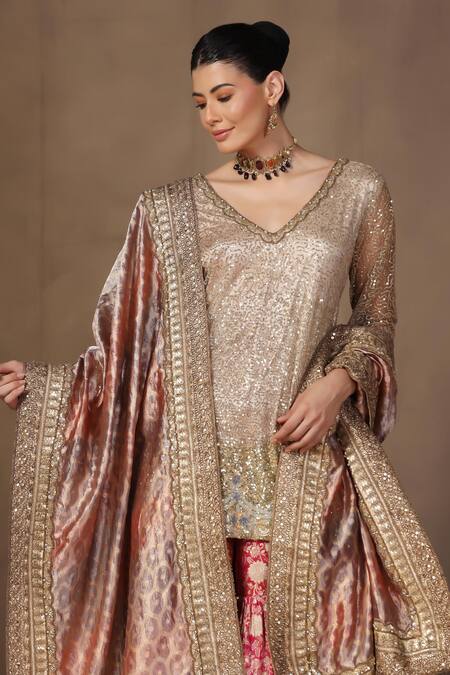 Shop tara thakur Gold Tissue, Brocade Sequins, Zari V-neck Embroidered Tunic Sharara Set Shop_tara thakur_Gold Tissue, Brocade Sequins, Zari V-neck Embroidered Tunic Sharara Set
