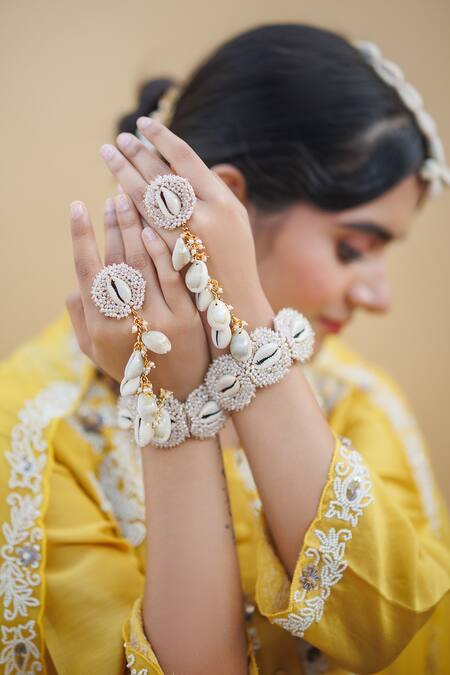 Kanyaadhan By Dhirajaayushi Cream Beads, Pearls Cowrie Shell Embellished Jewellery Set Online at Aza Fashions Kanyaadhan By Dhirajaayushi_Cream Beads, Pearls Cowrie Shell Embellished Jewellery Set _Online_at_Aza_Fashions