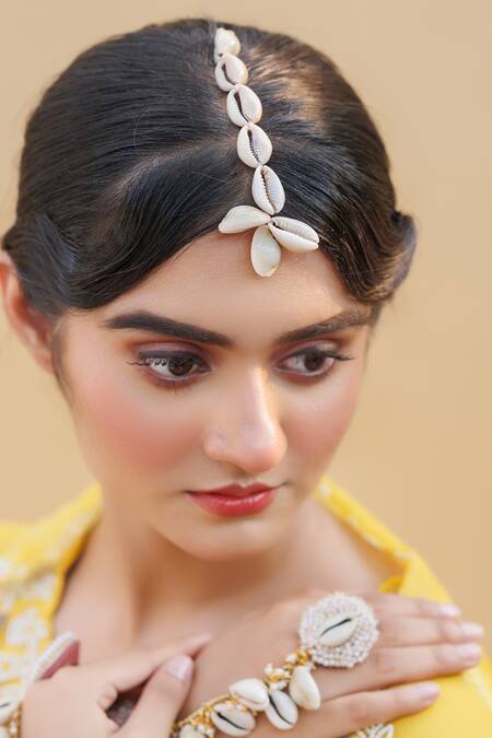 Shop Kanyaadhan By Dhirajaayushi Cream Beads, Pearls Cowrie Shell Embellished Jewellery Set Online at Aza Fashions Shop_Kanyaadhan By Dhirajaayushi_Cream Beads, Pearls Cowrie Shell Embellished Jewellery Set _Online_at_Aza_Fashions