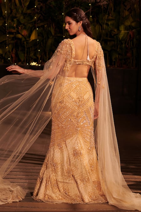 Shop Jigar & Nikita Gold Net Cut Work, Sequins, Pearls Geometric Cutdana Embroidered Lehenga Set at Aza Fashions Shop_Jigar & Nikita_Gold Net Cut Work, Sequins, Pearls Geometric Cutdana Embroidered Lehenga Set _at_Aza_Fashions