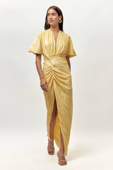 Buy Emblaze Yellow Net, Linen Sequins V-neck Ruched Front Slit Maxi Dress Online at Aza Fashions Buy_Emblaze_Yellow Net, Linen Sequins V-neck Ruched Front Slit Maxi Dress _Online_at_Aza_Fashions