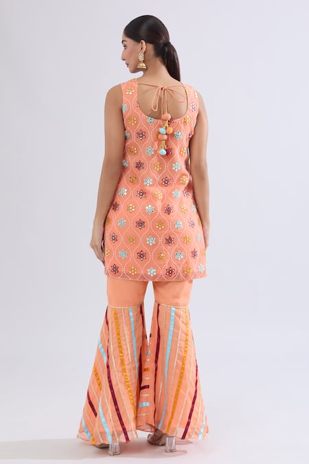 Shop Samyukta Singhania Peach Georgette Mirrors, Embroidery Round Neck Mughal Kurta Set at Aza Fashions Shop_Samyukta Singhania_Peach Georgette Mirrors, Embroidery Round Neck Mughal Kurta Set _at_Aza_Fashions