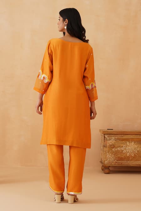 Shop Rishika Singh Orange Chanderi, Organza Sequins V-neck Wave Embroidered Kurta Pant Set at Aza Fashions Shop_Rishika Singh_Orange Chanderi, Organza Sequins V-neck Wave Embroidered Kurta Pant Set _at_Aza_Fashions