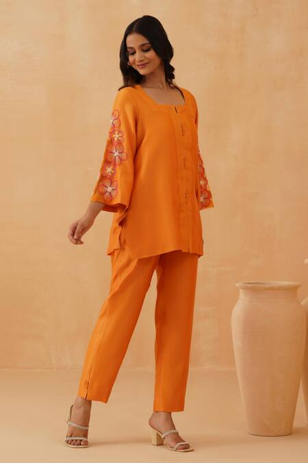 Rishika Singh_Orange Chanderi Beads Round Neck Bloom Short Kurta Set _Online_at_Aza_Fashions