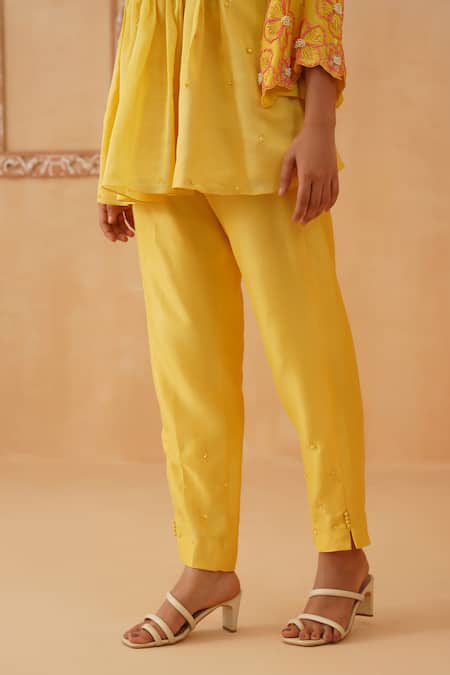 Rishika Singh_Yellow Chanderi Beads, Embroidery V-neck Honeycomb Smocked Peplum Kurta Set _Online_at_Aza_Fashions