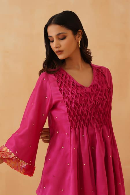 Rishika Singh_Pink Chanderi Beads V-neck Honeycomb Smocked Yoke Peplum Kurta Set _at_Aza_Fashions