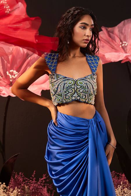 Rishika Singh Blue Net, Satin, Lycra Pearls, Cut Floral Embroidered Blouse And Draped Skirt Online at Aza Fashions Rishika Singh_Blue Net, Satin, Lycra Pearls, Cut Floral Embroidered Blouse And Draped Skirt _Online_at_Aza_Fashions