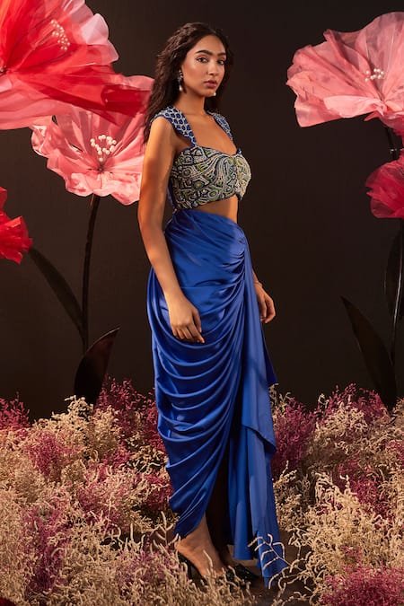 Shop Rishika Singh Blue Net, Satin, Lycra Pearls, Cut Floral Embroidered Blouse And Draped Skirt Online at Aza Fashions Shop_Rishika Singh_Blue Net, Satin, Lycra Pearls, Cut Floral Embroidered Blouse And Draped Skirt _Online_at_Aza_Fashions