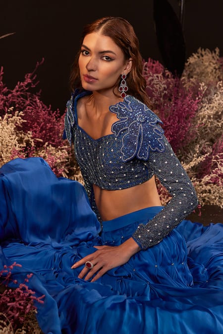 Rishika Singh_Blue Net, Satin, Georgette Cut Work, Embroidery, Beads, Blouse And Smocked Lehenga _Online_at_Aza_Fashions