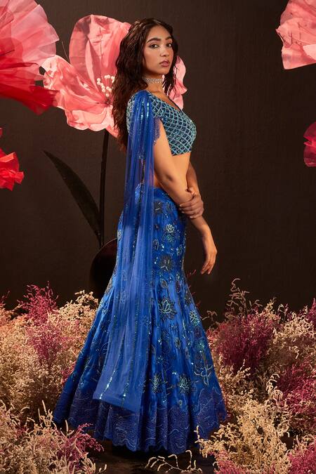 Shop Rishika Singh Blue Net, Silk Organza Embroidery, Sequins V-neck Midnight Bloom Lehenga Set Online at Aza Fashions Shop_Rishika Singh_Blue Net, Silk Organza Embroidery, Sequins V-neck Midnight Bloom Lehenga Set _Online_at_Aza_Fashions