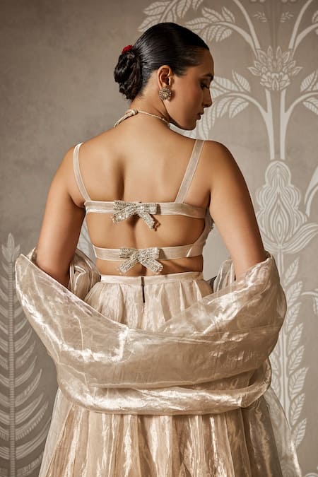 Ridhi Mehra_Gold Tissue Embroidery, Lace Sweetheart Neck Lehenga Set _at_Aza_Fashions