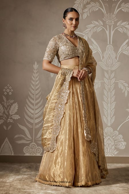Ridhi Mehra Gold Net, Tissue Sequins, Pearls V-neck Scallop Lace Lehenga Set Online at Aza Fashions Ridhi Mehra_Gold Net, Tissue Sequins, Pearls V-neck Scallop Lace Lehenga Set _Online_at_Aza_Fashions