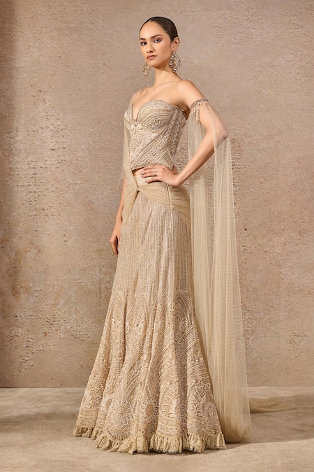 Shop_Tarun Tahiliani_Gold Tulle Crystals, Pearls, Sequins, Embellished Fish-tail Lehenga And Corset _Online_at_Aza_Fashions