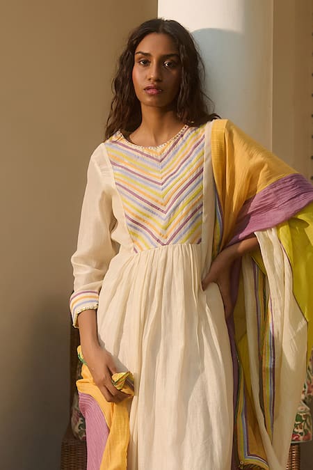 Shop Swatti Kapoor Ivory Chanderi, Cotton Beads, Tassels Round Stripe Patchwork Woven Kurta Set at Aza Fashions Shop_Swatti Kapoor_Ivory Chanderi, Cotton Beads, Tassels Round Stripe Patchwork Woven Kurta Set _at_Aza_Fashions
